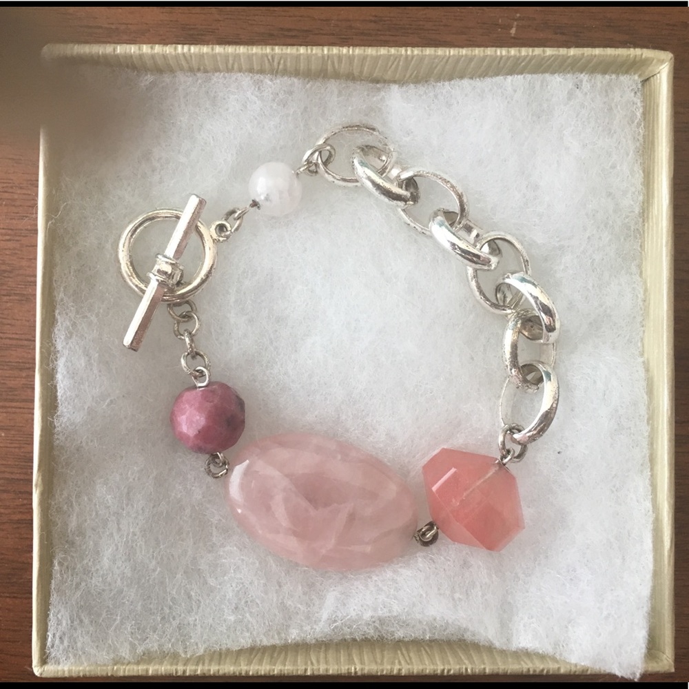 Pretty silvertone bracelet with pink stones
